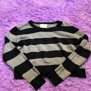 Cropped black and gray stripped long sleeve sweater.